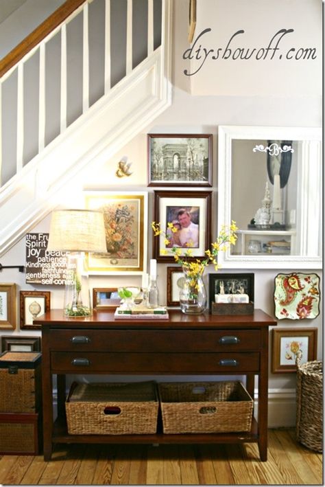 gallery3 like the way she did the arrangement on the little stairway area.  Hmmmm.... Stair Wall Decor, Stair Wall, Diy Shows, Under The Stairs, Diy Decorating, Entry Table, Under Stairs, Living Room Makeover, Furniture Arrangement