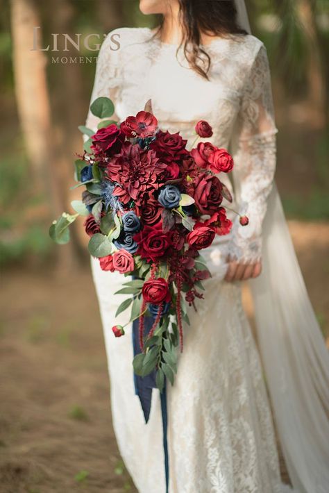 Luxury jewel tone color palette - burgundy, dark red, and navy. This deluxe bridal bouquet will accentuate the romance and sanctity of your wedding! Perfect for a vintage wedding ceremony, bridal shower, dinner as a bridal bouquet. #BridalBouquet #Bouquet #WeddingBouquet #WinterWedding #WeddingIdeas #DIYWedding #RusticWedding #Wedding #WeddingDecor #WeddingFlower #Weddingreception #NavyWedding #BurgundyWedding #RedWedding