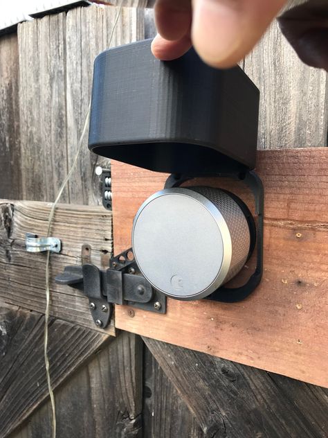 "This Adapter enables your August Smart Lock (3rd Gen, Pro 3rd Ge, or Wi-Fi 4th Gen) to lock and unlock the included 5-1/2\" barn door flip latch for mounting on yard gates and similar types of doors. An August Smart Keypad installed outside the gate will give keyless access whenever you do not have your smartphone on you. Moreover, with personal, temporary codes you can give one-time access to e.g. gardening or pool services, and keep track of who entered and when. The included weatherproof hou Gate Lock Ideas Metal Outdoor, Gate Locks Outdoor, Yard Gates, Door Flip, Doors Locks, Barn Door Lock, Yard Gate, Outdoor Gate, Gate Locks