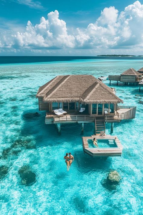 Escape to the Maldives with your partner for a dreamy romantic getaway. Stay in an overwater bungalow, enjoy snorkeling, spa treatments, and intimate dinners under the stars. 🏝️💫🌺 #MaldivesRomance #CouplesRetreat #TropicalLove Couples Maldives, Maldives Couple, Water Bungalow, Maldives Honeymoon, Dream Honeymoon, Overwater Bungalows, Maldives Travel, Couple Travel, Romantic Getaway