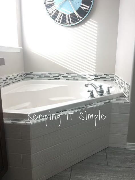 Keeping it Simple: Tips on How to Tile a Corner Bathtub using Wavecrest and Venatino Linear Mosaic Tiles Tiling A Bathtub, Tile Around Tub Ideas, Backsplash Around Tub, Corner Whirlpool Tub Surround Ideas, Corner Tub Tile Ideas, Bathtub Backsplash Ideas, Tile Around Bathtub Tub Surround, Tiling Around Bathtub, Corner Tub Surround Ideas