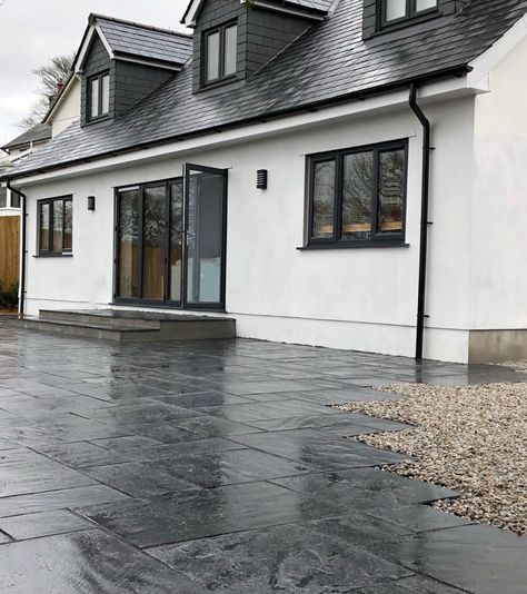 Blue Black Slate Paving 800x200 is a hard-wearing and durable natural stone paving designed for outdoor use and will stand the test of time, even in harsh weather! Black slate slabs are suited to the British climate offer a robust paving option which will last for decades! The dark tones will create an eye-catching finish to any exterior space and also look great when wet with the bold tones across the riven surface texture becoming more accentuated.https://nustone.co.uk/product/blue-black-slate Bog Witch, Natural Stone Paving, Slate Paving, Witch Hut, Patio Kits, Slate Patio, Stone Paving, Black Grout, Patio Slabs