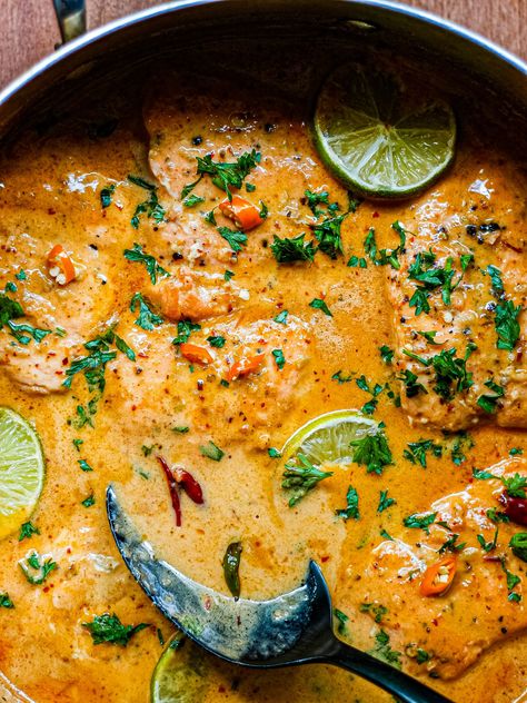 A simple, saucy and spicy 30 minute to make Thai Red Curry with salmon. This is the perfect weeknight dinner to put together. You can serve with a side of white rice or naan bread to dip into the delicious vibrant Thai red curry sauce. Olive Platter, Thai Salmon, Red Curry Recipe, Salmon Soup, Salmon Curry, Thai Chili Pepper, Red Curry Sauce, Coconut Fish, Coconut Curry Sauce