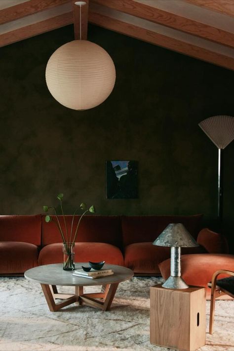 We created a vaulted ceiling to expose the structure of the home and plastered the walls in a deep green to reflect the amazing site. 🩶 The room is centered around our Raphaëlle Coffee Table from our object collection. Photograph by @william.jess.laird Styling by @austindwhittle Featured in @elledecor Special thanks to @theculturecreative San Francisco Interiors, Vaulted Ceiling Living Room, California Architecture, Beni Rugs, Living Room Green, Special Thanks, Residential Architecture, Vaulted Ceiling, Elle Decor