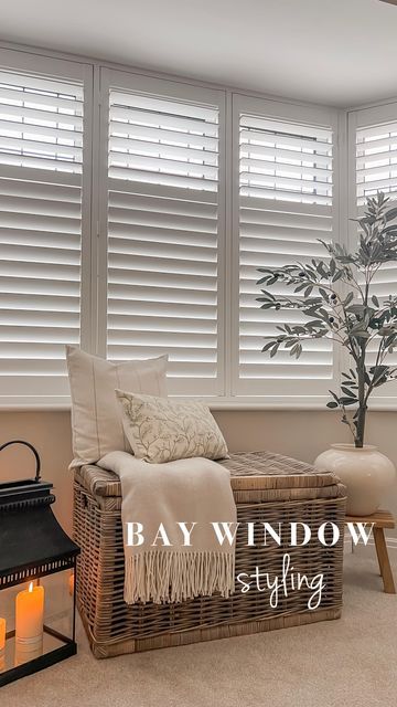 White Shutters Bay Window, Bay Window Styling, Shutters Interior Window Living Room, Shutters Bay Window, Trunk Styling, Rattan Trunk, Shutters Interior Window, Bay Window Bedroom, Bay Window Decor