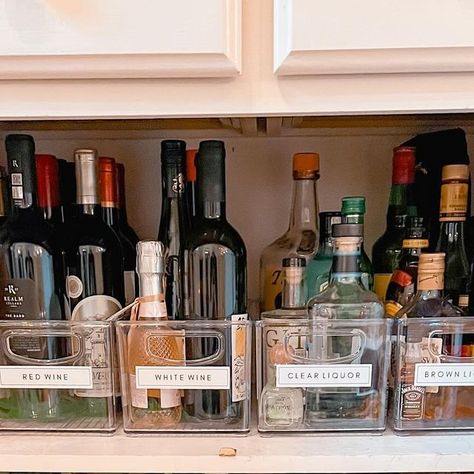 Sort + Simplify Organizing on Instagram: "This bar cabinet is ready for all the holiday cocktails🍸🎄✨ Shop this cabinet in stories and my LTK shop, linked in bio #sortandsimplifyorganizing #nashvillesmallbusiness #nashvilleorganizer #barorganization #cabinetorganization #liquorstorage" Alcohol Cabinet Storage, How To Store Alcohol Bottles At Home, Bar Cabinet Organization, Alcohol Organization Ideas, Liquor Organization, Liquor Storage Ideas, Bar Organization Ideas, Alcohol Cabinet, Alcohol Storage