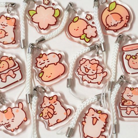 ❣ ~ 1 x 1-inch acrylic charm of cats with a peach theme! * Double-sided charm with double-sided epoxy * Comes with a white strap * Same image is on both sides of the charm * Drawn by me! ✉ Packaging ✉ Packaged and shipped in a bubble mailer ✈ Shipping ✈ If ordering other products with preorder items, the package will ship when all items have arrived and will ship everything together Shipping Options: * Domestic 2 ~ 6 days [USPS First Class Domestic Shipping] * International 10 ~ 20+ days depending on location [USPS First Class Package International Service] Cute Aesthetic Keychains, Pin Keychain, Cute Keychains, Alphabet Sounds, Kawaii Dessert, Shrinky Dink, Acrylic Keychains, Cat Keychain, Cute Pens