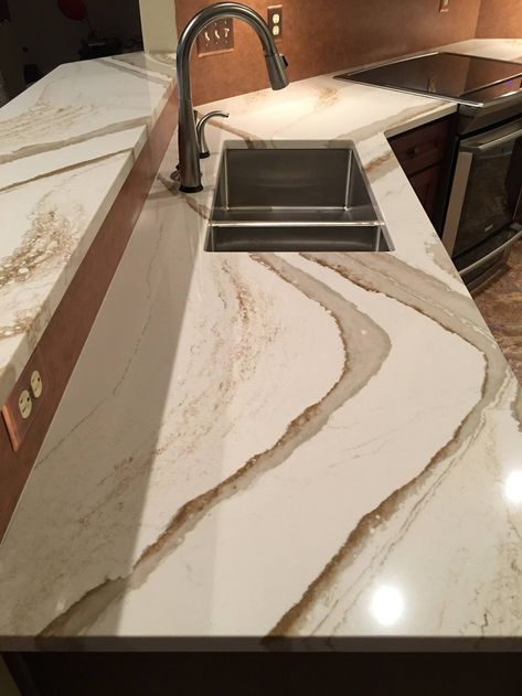 Britannica Gold Countertops, Cambrian Brittanica Quartz, Cambria Gold Quartz Countertops, Brittanica Gold Cambria Quartz, Cambria Quartz Countertops Colors, Calcutta Gold Quartz Countertops, Cambria Quartz Kitchen Countertops, Quartz Countertops Colors, Quartz Bathroom