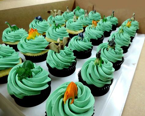 Dino-mite cupcakes for a happy client. #cupcakes #chocolate #green #dinosaurs #instacake #yum #birthday Three Rex Birthday Cupcakes, Dinasour Cupcake Cakes, Three Rex Cupcakes, Dinasour Birthday Cupcake Ideas, Dinosaur Birthday Cupcakes, Dino Cupcakes, Dino Themed Cupcakes, Trex Dinosaur Cupcakes, Cupcake And Dino