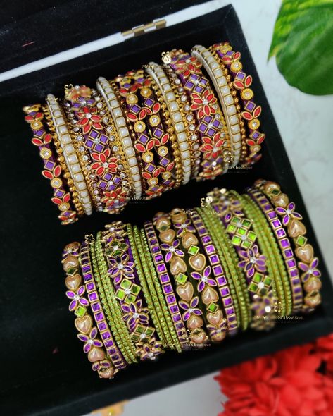 ⚜️ Customized bridal kundan bangles for wedding ❣️ ⚜️ Set 1 :: 3d Kundan Bangles in Purple with red and pearl bangles ♥️♥️ ⚜️ Set 2 :: 3d Kundan Bangles in Purple with Parrot green combo 💜💚 😍 𝗥𝗲𝗮𝗱𝘆 𝘁𝗼 𝗰𝗿𝗲𝗮𝘁𝗲 𝗮 𝗰𝘂𝘀𝘁𝗼𝗺 𝗺𝗮𝘀𝘁𝗲𝗿𝗽𝗶𝗲𝗰𝗲? ✨ 𝗦𝗲𝗻𝗱 𝘂𝘀 𝗮 𝗽𝗶𝗰 𝗼𝗳 𝘆𝗼𝘂𝗿 𝘀𝗮𝗿𝗲𝗲, 𝗮𝗻𝗱 𝗹𝗲𝘁’𝘀 𝗮𝗱𝗱 𝗮 𝘁𝗼𝘂𝗰𝗵 𝗼𝗳 𝗺𝗮𝗴𝗶𝗰. 𝗪𝗼𝗿𝗹𝗱𝘄𝗶𝗱𝗲 𝘀𝗵𝗶𝗽𝗽𝗶𝗻𝗴 𝗮𝘃𝗮𝗶𝗹𝗮𝗯𝗹𝗲 📸🌏 💌 𝗗𝗠 𝗼𝗿 𝗪𝗵𝗮𝘁𝘀𝗔𝗽𝗽 𝘁𝗼 𝘁𝘂𝗿𝗻 𝘆𝗼𝘂𝗿 𝗯𝗿𝗶𝗱𝗮𝗹 𝗱𝗿𝗲𝗮𝗺𝘀 𝗶𝗻𝘁𝗼 𝗿𝗲𝗮𝗹𝗶𝘁𝘆! 𝗙𝗼𝗹𝗹𝗼𝘄 @maya_venba_boutique 𝗳𝗼𝗿 𝗺𝗼𝗿𝗲 𝗲𝘅𝗾𝘂𝗶𝘀𝗶𝘁𝗲 𝗯𝗮𝗻𝗴𝗹𝗲 𝗰𝗼𝗹𝗹𝗲𝗰𝘁𝗶𝗼𝗻𝘀 𝘄𝗶𝘁𝗵 𝗲𝘅𝗰𝗹𝘂𝘀𝗶𝘃𝗲 𝗳𝗶𝗻𝗶𝘀𝗵𝗶𝗻𝗴 ❣️ #maya_venba_b... 3d Thread Bangles, Bangles For Wedding, Bangles Collection, Pearl Bangles, Silk Thread Bangles Design, Silk Bangles, Thread Bangles Design, Bangles Diy, Kundan Bangles