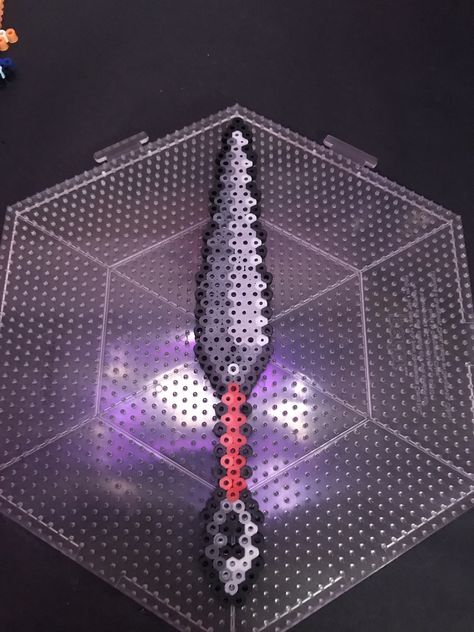 Perler Bead Naruto Kunai knife made by Kelsey flaherty Hama Beads Knife, Perler Bead Knife Patterns, Perler Bead Patterns Knife, Perler Beads Knife, Knife Perler Beads, Hamma Beads Ideas Aesthetic, Naruto Perler Beads, Naruto Perler, Perler Bead Ornaments Pattern