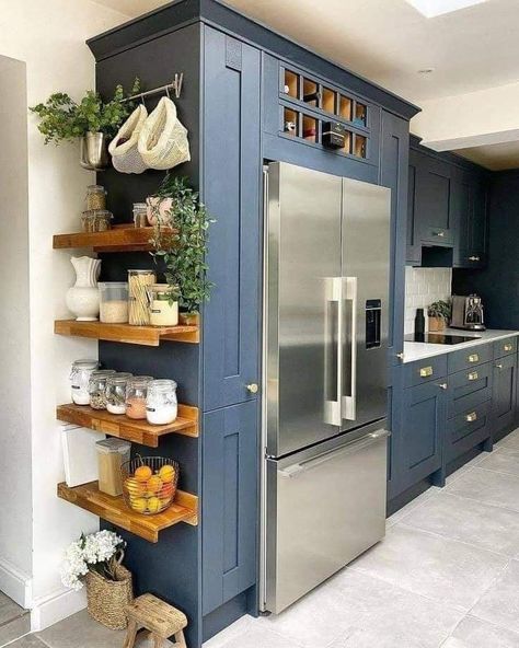 Awkward Space Kitchen, Stove Next To Refrigerator Layout, Open Shelves At End Of Kitchen Cabinets, Kitchen Island With Support Post Brick, Painted Kitchen Cabinets Apartment, Kitchen Cabinets On One Wall, Side Of Cabinet Ideas Kitchen, Small Kitchen With A Lot Of Storage, Shelves Around Refrigerator