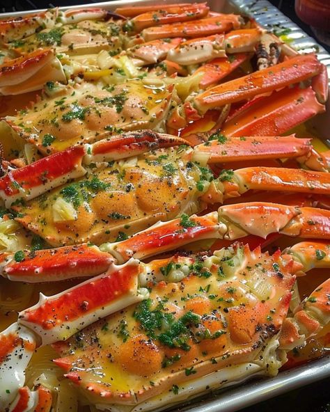 Indulge in the ultimate seafood experience with our Baked Crab Legs in Butter Sauce. Perfectly baked and buttery delicious! 🦀✨  ￼  Ingredients:  2 pounds king crab legs, split and cleaned 1 cup unsalted butter, melted 4 cloves garlic, minced 1 tablespoon lemon juice 1 teaspoon Old Bay seasoning 1 tablespoon fresh parsley, chopped Lemon wedges for serving Directions:  Preheat your oven to 375°F (190°C). Arrange the crab legs in a single layer on a baking sheet. In a small bowl, combine the melted butter, minced garlic, lemon juice, and Old Bay seasoning. Pour the butter mixture evenly over the crab legs, ensuring they are well coated. Cover the baking sheet with aluminum foil and bake for 25 minutes, or until the crab legs are heated through and the butter sauce is bubbling. Remove from th Baked Crab Legs Oven, King Crab Recipes, Crab Leg Dinner, Roasted Crab, Dungeness Crab Legs, Crab Legs Recipe, Baked Crab, Crab Dishes, King Crab Legs