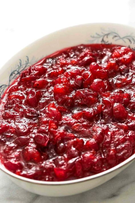 This homemade cranberry sauce is classic. Made from fresh or frozen cranberries and ready in 20 minutes, it's a must-have for Thanksgiving dinner. Easy to make-ahead, too! #Thanksgiving #CranberrySauce #HolidaySide #Cranberries #simplyrecipes Cranberry Pear Sauce, Cranberry Sauce Recipes, Cherry Salad, Vegetarian Holiday Recipes, Cherries Salad, Wheat Berry, Canned Cranberry Sauce, Sugared Cranberries, Cranberry Sauce Recipe