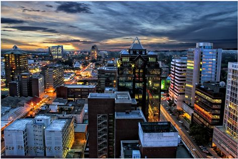 City of Harare Zimbabwe by night - 2017  Harare Beautiful Place, Harare Night Images, Harare top buildings, TravelWideFlights African Cities, Zimbabwe Flag, Harare Zimbabwe, Capital Cities, Past Exams, Africa Do Sul, Night Images, Victoria Falls, Photo Competition