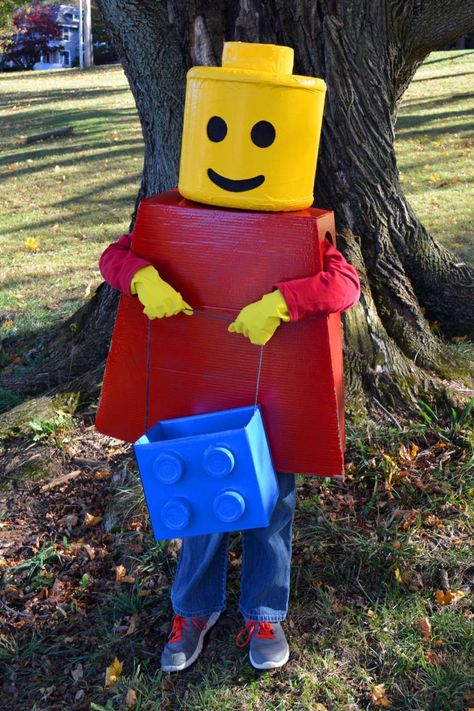 This costume was home made for my son who was seven years old at the time. The head was made from a piece of construction tube bought at the hardware store. The top of the head was shaped with pieces of sytrofoam bought at the craft store and the eyes and nose were cut out. … Lego People Costume Diy, Lego Person Costume, Diy Halloween Decorations Outdoor Scary, Diy Lego Costume, Halloween Decorations Outdoor Scary, Lego Costume Diy, Lego Man Costumes, Lego Costumes, Diy Halloween Decorations Outdoor