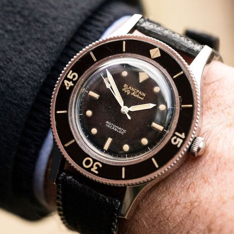 The Blancpain Fifty Fathoms “Rotomatic Incabloc” was the first Blancpain Fifty Fathoms variant in the 1950s. This incredible and original example came before Jacques Cousteau co branded with AquaLung a few years later. DM for details 😯 Blancpain Fifty Fathoms, Holy Diver, Jacques Cousteau, Fifty Fathoms, Watchful Eye, Clean Living, Classic Watches, Dive Watches, The 1950s