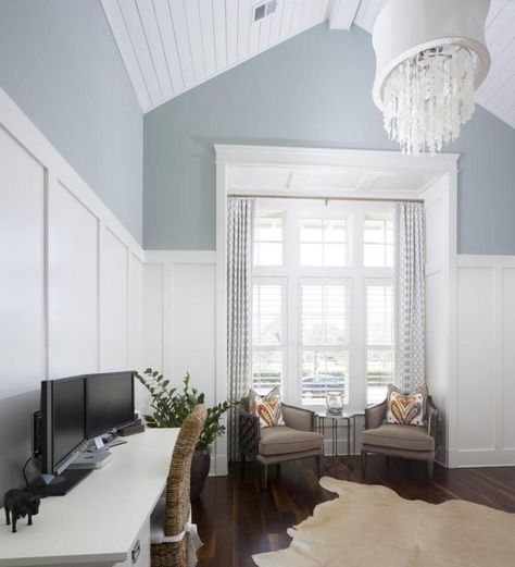 Beautiful white wall paneling with timber vaulted ceiling.  Love the wall paint colour! Vaulted Ceiling Paneled Walls, Wainscot Vaulted Ceiling, Panelled Walls And Ceiling, Panel Accent Wall Vaulted Ceiling, Panel Wall Vaulted Ceiling, Painted Pitched Ceiling, White Walls With Feature Wall, Panelled Walls High Ceiling, Trim On Vaulted Wall