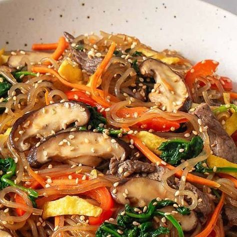 Megan + Eliezer | Takes Two Eggs on Instagram: "This easy to make Japchae is so colorful and packed with flavor! 🍜 You’ll love this Korean stir-fry with bouncy sweet potato starch noodles, vibrant sauteed vegetables, and tender beef coated in a sweet, savory, and umami sauce. Tap the link in our bio for the detailed recipe on our recipe website, or simply google “takes two eggs japchae” 😇 And please excuse my temporary lisp 🙏🏻🥺 . . . #japchae #noodles #koreanrecipes #chapchae #koreanrecipe Potato Starch Noodles, Umami Sauce, Japchae Noodles, Korean Stir Fry, Joanna Gaines Recipes, Recipe Website, Cooking Tofu, Easy Foods, Korean Recipes