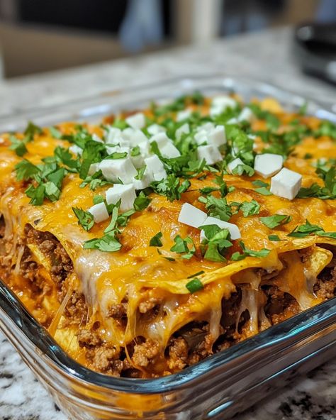 This is such a fun twist on a classic dish! My family gets super excited whenever I make this Walking Taco Casserole. It combines all the flavors we love in tacos but served in a way that makes it easy and yummy!

Ingredients:
- 1 pound ground beef
- 2 cups crushed nacho cheese tortilla chips
- 1 can (15 oz) black beans, drained and rinsed

For the rest of the ingredients and to learn how to put it all together, Link in first comment [👇] [👇]

This dish is perfect for parties or family movie nights—everyone picks their own toppings! Can't wait for you to try it!

#WalkingTacoCasserole #EasyDinner #FamilyFavorite #TacoNight #QuickRecipes Walking Taco Casserole, Walking Taco, Walking Tacos, Taco Casserole, Nacho Cheese, Taco Night, Family Movie, Family Movie Night, Movie Nights