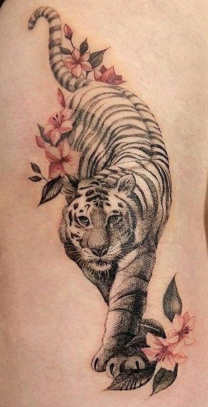 21 Spiritual Protection Tattoo Ideas You'll LOVE - Spirithandbook Small Lion Tattoo For Women, Tiger Tattoo Thigh, White Tiger Tattoo, Tiger Lily Tattoos, Small Lion Tattoo, Tiger Tattoo Sleeve, Protection Tattoo, Women Strength, Flores Tattoo