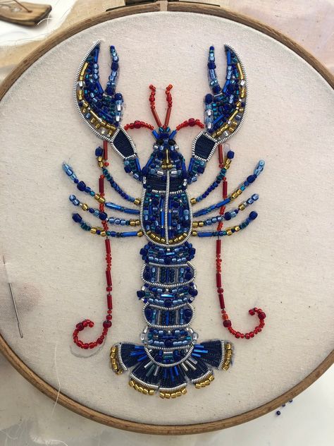 This lobster is embroidered with colorful beads and features a hand-stitched mouth and claws. It's perfect for adding a touch of whimsy to your home decor. #lobster #embroidery #beaded . #Oder #Beaded_Work_Embroidery #Mermaid_Tail_Embroidery #Bead_Embroidery_Inspiration Bead Embroidery Inspiration, Beads Art Ideas, Embroider With Beads, Embroidery And Beading, How To Make Embroidered Patches, Glass Bead Embroidery, Beaded Embroidery Ideas, Bead Embroidery Jewelry Tutorial, Beaded Embroidery Designs