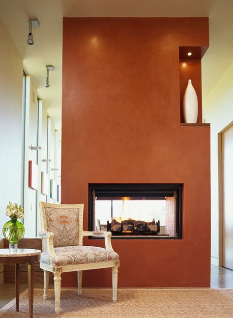 Love this #fireplace in Hillside Haven in #SanAnselmo, #Marin, #California | #Modern #Greens #Blues #Yellows #VintageFurniture #CustomPieces #Architecture #InteriorDesign #Rust #Orange Fall Curtains, Fireplace Accent Walls, Fireplace Feature Wall, Modern Family Rooms, Canapé Design, Architect House, Brick Fireplace, Fireplace Design, Contemporary Living Room