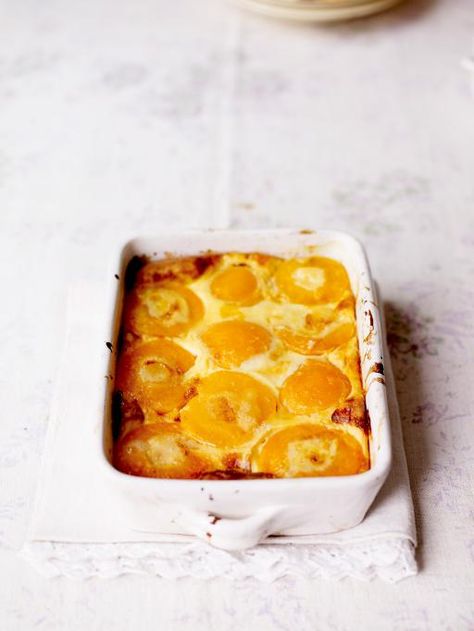 nan's peach clafoutis | Jamie Oliver | Food | Jamie Oliver (UK)    simple and tasty - serve it on a Sunday morning with fresh berries. Uk Desserts, Blackberry Clafoutis, French Pudding, Peach Clafoutis, Jaime Oliver, Fudge Caramel, Clafoutis Recipes, Cherry Clafoutis, Fruit Pudding