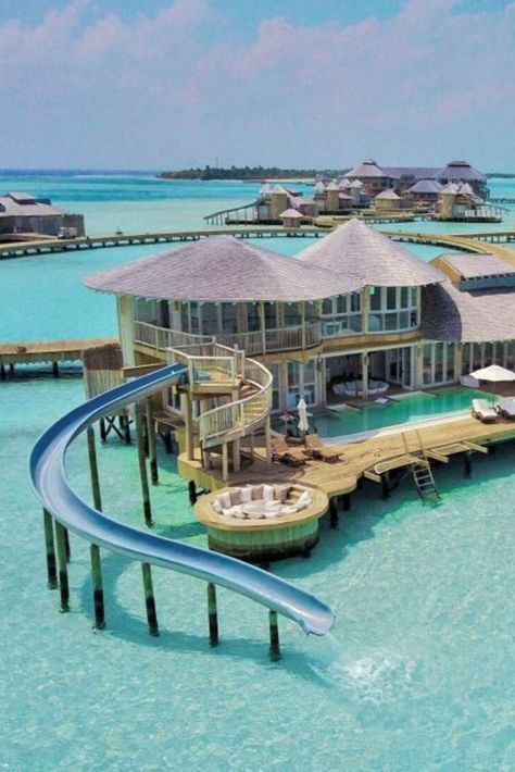 Mansion On The Water, Bahamas House On Water, Maldives House On Water, Slide In A House, House In Water, Huts On The Water, Cool Water Slides, Bahamas House, Ocean Villa