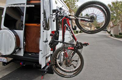 Roadtrek Modifications/ Mods, Upgrades, and Gadgets.: DIY Hitch Mounted Vertical Bike Rack/ Cargo Carrier that Does Not Interfere with the Rear Spare Tire Roadtrek Modifications, Tire Diy, Diy Bike Rack, Glider Cushions, Vertical Bike Rack, Rear Bike Rack, Hitch Bike Rack, Bike Hitch, Vertical Bike