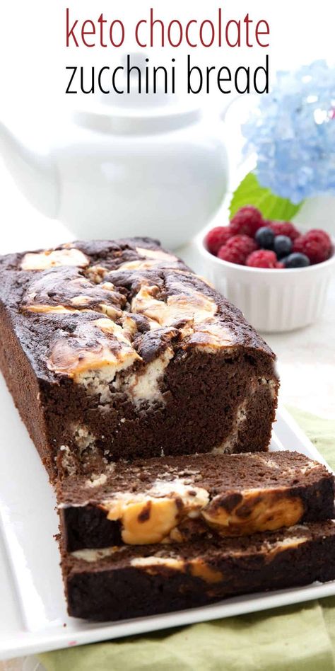 This Keto Chocolate Zucchini Bread has a delicious swirl of sugar-free cheesecake! It's a delicious breakfast or snack, and a great way to use the bountiful low carb zucchini. Keto Chocolate Zucchini Bread Recipes, Low Carb Chocolate Zucchini Bread, Zucchini Bread Low Sugar, Keto Chocolate Zucchini Bread, Low Carb Low Sugar Recipes, Low Carb Low Sugar Desserts, Sugar Free Zucchini Bread, Keto Zucchini Recipes, Health Baking