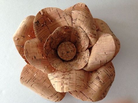 I found cork ribbon on clearance and knew exactly what I would do with it. I love cork and think having it available in ribbon opens up more possibilities in creativity. Regular cork is just too bulky and stiff to actually make flexible things. I've always wanted to make cork flowers out of cork. I actually tried to make small ones using wine corks, but I wasn't handy with carving and gave up rather quickly. Now I had my chance. I bought two different sizes of cork ribbon and didn't waste any ti Wine Cork Diy Projects, Cork Diy Projects, Diy Cork, Wine Cork Diy Crafts, Wine Cork Projects, Cork Bottle, Wine Cork Diy, Ribbon Flower Tutorial, Cork Projects