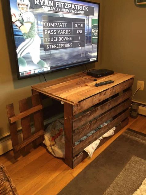 I was in need of a table in the den after putting my tv on the wall and removing my old 90's entertainment center. I also wanted to free up the space used by my dogs crate in the room. So I combined the two with my first pallet project.  #PalletDoghouse, #PalletTable, #ReclaimedPallet #PalletDesksPalletTables Table Dog Crate, Dog Crate Table, Table Palette, Diy Dog Crate, Diy Dog Kennel, Crate Table, Crate Diy, Large Dog Crate, Dog Crate Furniture