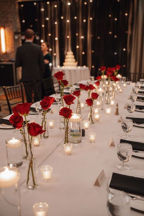 Classic Red Rose Wedding, Red Roses Centerpieces Birthday, Black Tie Wedding With Red Roses, White And Red Table Decor, Red Roses Dinner Table Settings, All Red Wedding Reception, Red Roses Table Centerpieces, Valentines Day Wedding Decorations, Phantom Of The Opera Themed Wedding