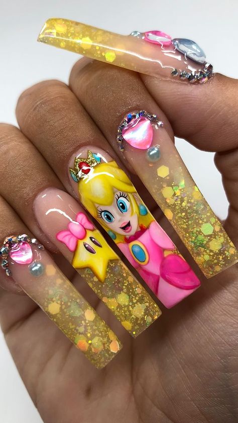 30 Pretty Long Nails to Inspire You Princess Daisy Inspired Nails, Long Disney Acrylic Nails, Mario Themed Nails, Princess Peach Nail Art, Bowser Nails, Character Design Nails, Videogame Nails, Princess Peach Nails, Character Nail Designs