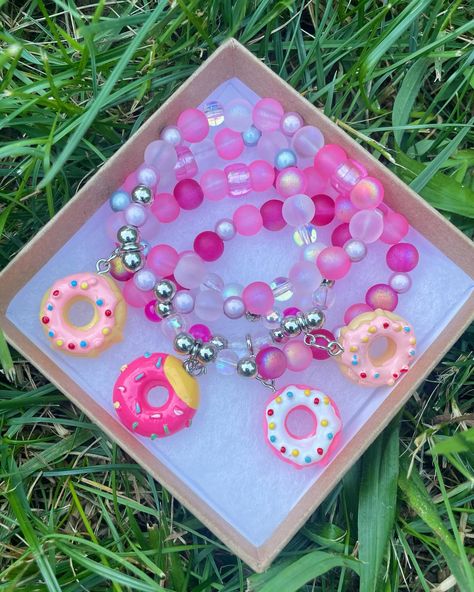 DreamyMoodFoods Donut Charm Bracelets are available now for DM Sale and include a special Friendship Deal - get one donut charm bracelet for $15 or 2 for $20 - it’s even more sweet when you give one to a friend! ✨🍩💜👩🏽‍🍳💕🤖 These sweet donuts have been baked from home with love ✨🍩 DM to claim ✨ Free Yummy surprise Gifts included with your order! #dreamymoodfoods #dreambracelets #friendshipbracelets #donutjewelry #beadbuddies #foodcharms #foodjewelry #handmadejewelry #donutinspiredart Donut Jewelry, Food Charms, Food Jewelry, Surprise Gifts, Charm Bracelets, Get One, Friendship Bracelets, Donuts, From Home