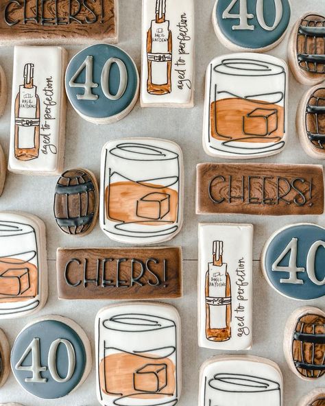 40th Birthday Custom Cookies. Collage of various shaped cookies, bourbon glass with icecube, barrel cookie, cheers cookie with wood background, bourbon bottle cookie with "aged to perfection" words, round "40" cookie.  Bourbon Country theme, bourbon cookies,  cheers to 40 years cookies, butter cookies, sugar cookies.  MH Cookie Shoppe #CookiesBringJoy Whiskey Bottle Cookies Decorated, Bourbon Themed 40th Birthday Party, Bourbon Glass Cookies Decorated, 1983 Birthday Cookies, Cheers Themed Birthday Party, 21st Birthday Cookies Decorated For Guys, Whiskey Theme Cookies, Vodka Cookies Decorated, Birthday Cookies Decorated Men 30