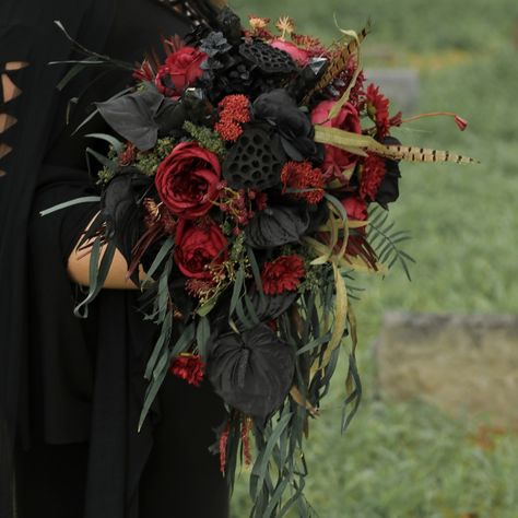 This Large Statement bouquet is highlighted with 3 Black Onyx Crystals and a Crystal Cut Ruby Zoisite Wand Handle, black roses and deep burgundy red roses and dark olive green preserved weeping willow branches, pheasant feathers . Check out our other creations on our Etsy Shop: https://weddingbouquetsaz.etsy.com or our website- http://Bouquets.Wedding for more styles and selections of pre-made bouquets and boutonnieres. We take orders for custom creations! or http://GothicWeddingBouquets.co... Gothic Bouquet, Onyx Crystal, Bouquets Wedding, Willow Branches, Weeping Willow, Black Roses, Pheasant Feathers, Ruby Zoisite, Dark Olive Green