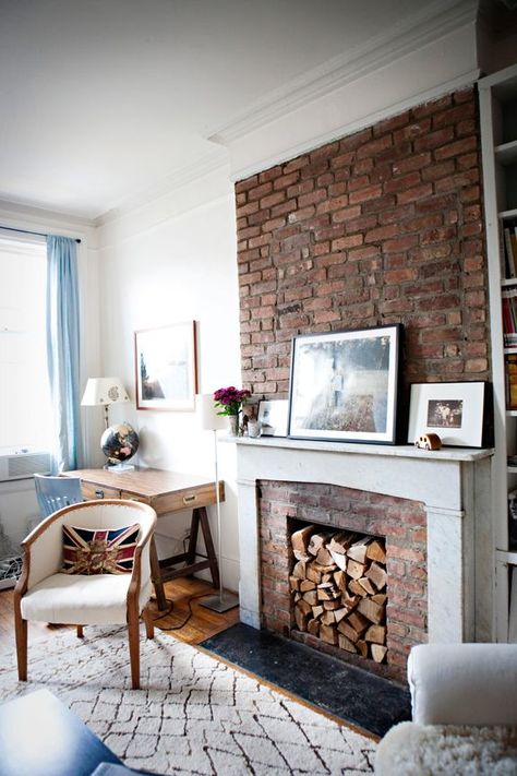 Our house tour | A Cup of Jo Unused Fireplace, Red Brick Fireplaces, White Brick Fireplace, White Mantel, Campaign Furniture, White Fireplace, Faux Fireplace, Diy Fireplace, Up House