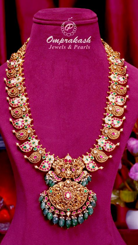 Embrace versatility and tradition with this 6 in 1 Nakshi Kundan Mango Haram. Exquisitely designed to offer multiple looks, it’s perfect for adding a touch of elegance to any occasion  #diamond #earrings #emerald #necklace #diamondjewellery #gemstones #southindianjewellery #southjewellers #bridaljewellery #bridaljewelry #nakshijewellery #ethnicjewellery #heritagejewellery #916kdmjewellery #bridaljewellery #southbrides Kundan Necklace Simple, Mango Haram Designs, Mango Haram, Heavy Jewelry, Kuchu Designs, Long Haram, Earrings Emerald, Heritage Jewellery, Gold Necklace Simple