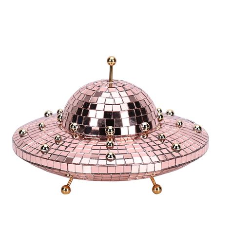 PRICES MAY VARY. Unique Spacecraft Design: This disco ball lamp is crafted to resemble a futuristic spacecraft, complete with mirrored tiles and golden antenna accents, adding a playful yet stylish touch to any room. Compact and Decorative: With dimensions of 20cm by 13cm, this lamp is perfectly sized to fit on desks, shelves, or bedside tables, providing a charming decoration without taking up too much space. Vivid Pink Color: The lamp's vibrant pink hue, complemented by reflective mirrors and Disco Ball Lamp, Spaceship Decor, Pink Disco Ball, Desks Shelves, Mirrored Tile, Spacecraft Design, Ball Lamp, Ball Lamps, Disco Lights