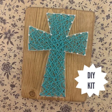 A cross string art sign would be the perfect spring craft. This do-it-yourself sign kit would be the perfect decoration for Easter. It could also be given as a special gift to a loved one. OVERVIEW The wood board measures 4 1/4 wide X 6” tall. These crosses have been strung with two contrasting Christian Art Projects, Easter Spring Crafts, Cross String Art, Diy For Adults, Vbs Craft, Make Your Own Sign, Camp Crafts, Bible School Crafts, Religious Crafts