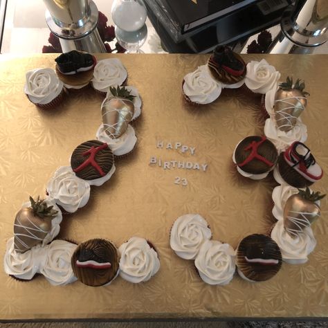 Jordan 23 pull apart cupcakes.  #jordan  #monogramcupcakes  #pullapartcake 23 Pull Apart Cupcake, Jordan Year Birthday 23 Ideas Women, Jordan Cupcakes, 19 Bday, Jordan Cake, Monogram Cupcakes, Shoe Cupcakes, 23 Jordan, Pull Apart Cupcake Cake