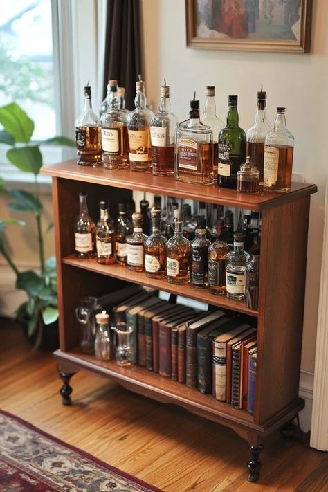 "Repurpose an old bookshelf into a custom Bar Cart! 🛠️🍹 Ideal for adding a chic, functional piece to your space. #UpcycledBookshelf #BarCartDIY #EntertainingInspiration" Bourbon Storage Ideas, Diy Drinks Cabinet, Bookshelf Bar Ideas, Whiskey Cabinet Ideas, Bar Storage Ideas, Bar Bookshelf, Home Bar Diy, Drinking Room, Bookshelf Bar