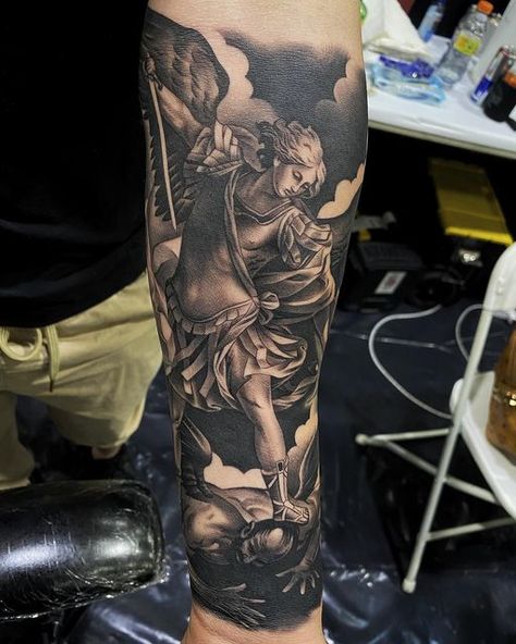 Em Morris shared a post on Instagram: "Amazing St. Michael’s arch angel by Reuster close up @reuster ! @inkedmag @worldofartists @gqstyle". Follow their account to see 9616 posts. St Michael Tattoo Forearm, Saint Michael Tattoo, Angel Tattoo Arm, Archangel Michael Tattoo, St Michael Tattoo, Photographer Tattoo, Evolution Tattoo, Arm Tattoos Drawing, Biblical Tattoos