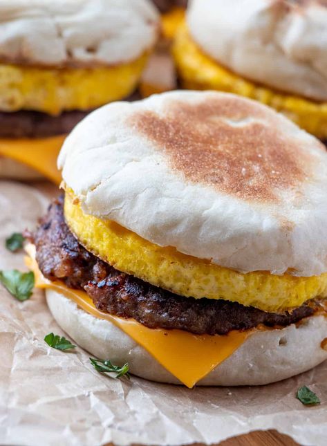 Want one of your favorite takeout items at home? This Copycat Sausage Egg McMuffin is seriously tasty, filling and everyone absolutely loves them. Sausage Egg Mcmuffin, Sausage And Egg Mcmuffin, Croissant Breakfast Sandwich, Egg Mcmuffin, Tater Tot Breakfast, Croissant Breakfast, Sausage Patty, Homemade Breakfast, Sausage And Egg