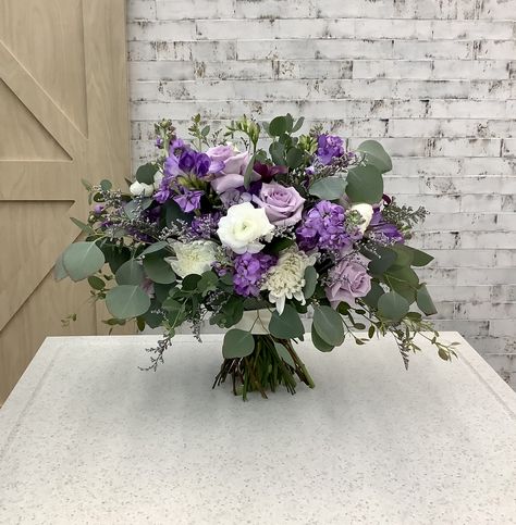 Purple Flower Bouquet Wedding, Purple And Eucalyptus Bouquet, Purple Bouquet With Eucalyptus, Purple White And Green Wedding Bouquets, Wedding Flower Arrangements Purple, Purple Wild Flower Wedding Bouquet, Purple Bridal Bouquet Real Flowers, Purple White Wedding, Wildflower Bridal Bouquets