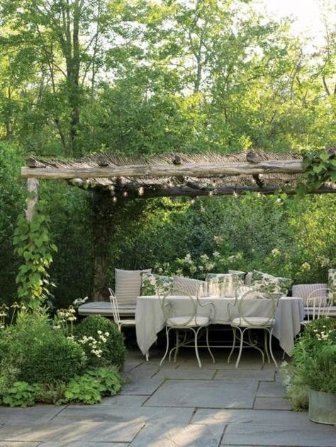 Beautiful pergola and sitting area, surrounded lush lush green gardens and a stone slab patio. Rustic Pergola, Outdoor Dining Area, Garden Structures, Garden Cottage, Garden Spaces, Outdoor Rooms, Garden Room, Dream Garden, Fencing