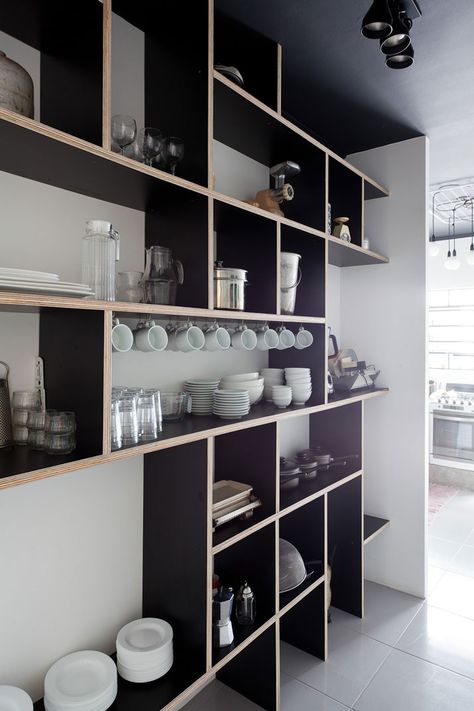 Plywood Shelving - 'We' Hostel in São Paulo, Brazil | Yatzer. I love the exposed edge! Hostels Design, Simple Kitchen Remodel, Black And White Kitchen, Shelving Units, Simple Kitchen, Kitchen Remodel Idea, Kitchen Shelves, 인테리어 디자인, White Kitchen