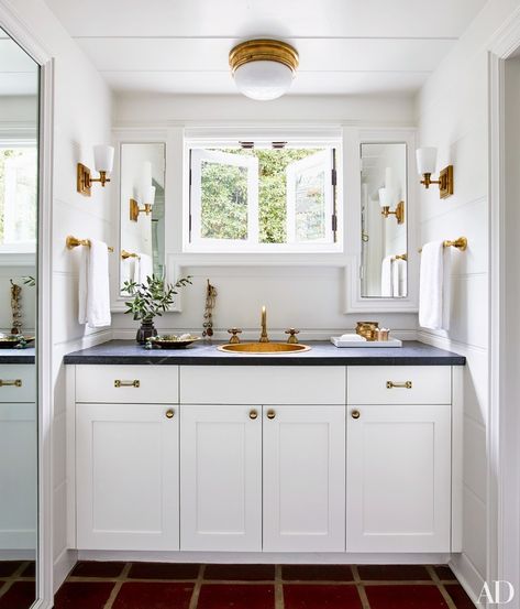 Bathroom Lighting Solutions - Studio McGee Small Bathroom Cabinets, Madeline Stuart, Sconces Living Room, Modern Mountain Home, Large Bathrooms, Counter Tops, White Bathroom, White Cabinets, Architectural Digest